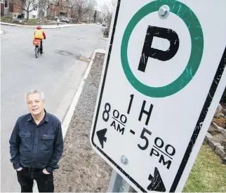  ?? ERROL McGIHON ?? Resident Ron Elliott is concerned about a proposal to eliminate 97 street parking spots along Spencer Street and put in painted bike lanes. “What the hell kind of sense does this make?” Elliott says.
