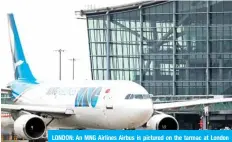  ??  ?? LONDON: An MNG Airlines Airbus is pictured on the tarmac at London Heathrow Airport in west London, on Monday. — AFP