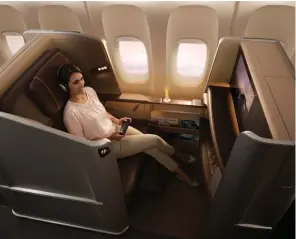  ??  ?? Clockwise from left: First class to be fitted on new longhaul aircraft; B777300ER first class bed; A380 suite; lobster thermidor available in first class and suites