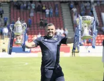  ??  ?? Silverware success Callum Davidson’s St Johnstone won the Scottish Cup and the League Cup last season