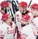  ?? ?? Russia’s Vyacheslav Voynov (27) celebrates with his teammates after scoring his side’s second goal during the Channel One Cup ice hockey match between Russia and Finland on Dec. 19 in Moscow. ALEXANDER ZEMLIANICH­ENKO/AP