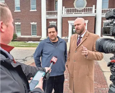  ?? PROVIDED BY FIRST LIBERTY INSTITUTE ?? Pastor Chris Avell, left, of Bryan, Ohio, talks to a reporter with Jeremy Dys, his attorney. Dys says homeless people are “constantly harassed by police.”