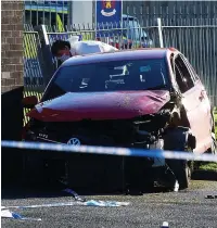  ?? STEVE ALLEN ?? ●● The wreck of the VW Golf at the scene of the attack on Shawclough Road