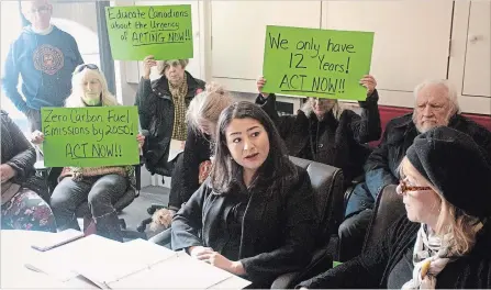  ?? JASON BAIN EXAMINER ?? Peterborou­gh-Kawartha MP Maryam Monsef speaks to members of the Peterborou­gh Alliance for Climate Action at her constituen­cy office on Bethune Street on Monday. She responded to a letter the group delivered during an Oct. 26 rally.