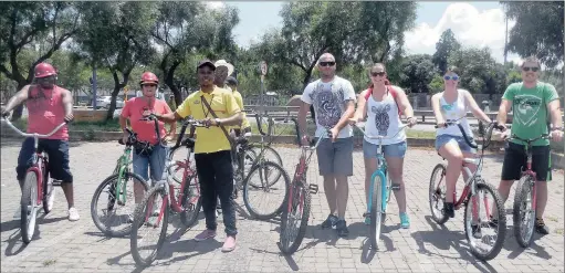  ?? PICTURES: HELEN GRANGE ?? A group of day-trippers set off on the Dzedze Travel and Tours bicycle ride around Soweto on a boiling Sunday afternoon.