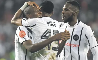  ?? Picture: Gallo Images ?? TOP JOB. Pirates’ Kabelo Dlamini (left) celebrates his goal with team-mates during their Absa Premiershi­p match against Polokwane City at Orlando Stadium on Tuesday night.