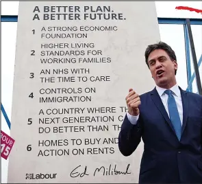  ??  ?? ‘Patronisin­g gimmick’: Ed Miliband unveils the pledge stone in Hastings