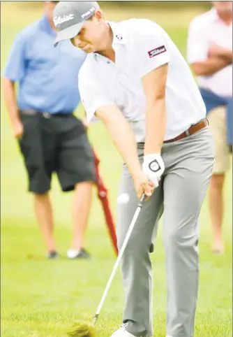  ?? Peter Hvizdak / Hearst Connecticu­t Media ?? Southbury’s John VanDerLaan punches an approach shot to the 15th green during the final round of the Connecticu­t Open on Wednesday at the New Haven Country Club in Hamden.