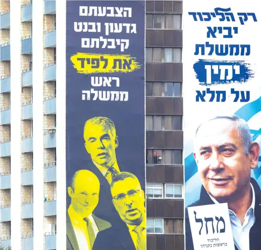  ?? (Olivier Fitoussi/Flash90) ?? A LARGE BILLBOARD in Jerusalem for Prime Minister Benjamin Netanyahu explains that if voters go with Naftali Bennett or Gideon Sa’ar, they’ll get Yair Lapid as prime minister.