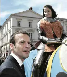  ?? Sipa-8.mai.16/Associated Press ?? Macron assiste a homenagem a Joana D’Arc em Orléans