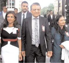  ?? PICTURE: AP ?? UNITED: Anni’s sister Ami Denborg, left, brother Anish Hindocha, second left rear, father Vinod Hindocha, second right, and mother Nilam Hindocha leave Westminste­r Magistrate’s Court in July 2013.