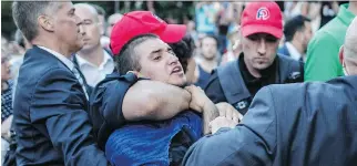  ?? DARIO AYALA/FILES ?? Esteban Torres Wicttorff, a known activist in the trans community, is arrested by police by Montreal police during a vigil at Parc de l’espoir in June 2016.