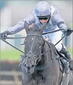  ??  ?? My Drogo, ridden by Harry Skelton, wins the Betway Mersey Novices’ Hurdle at Aintree