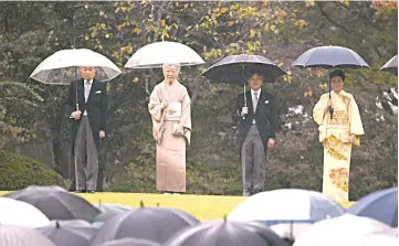  ??  ?? File photo shows (from left) Japan’s Emperor Akihito, Empress Michiko, Crown Prince Naruhito and Crown Princess Masako attend an autumn garden party at Akasaka Palace Imperial garden in Tokyo. — AFP photo