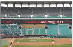  ?? The Associated Press ?? DIAMOND DIARIES: Stadium seats are empty as a part of precaution against the new coronaviru­s during a May 5 baseball game between Hanwha Eagles and SK Wyverns in Incheon, South Korea. Two-time All-Star Washington Nationals infielder Ryan Zimmerman is offering his thoughts as told to AP in a diary of sorts while waiting for the 2020 season to begin. In the sixth installmen­t, he discusses the return to American TV of baseball — South Korean baseball.