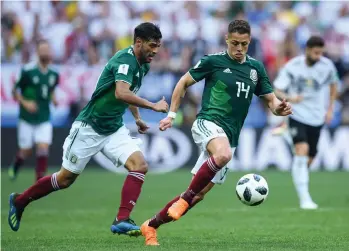  ?? /IMAGO7. ?? Javier Hernándezs (14) y Carlos Vela, durante el Mundial de Rusia 2018.