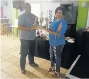  ?? Picture: CHESLIN PLAATJIES ?? ON THE UP: Rabia Noorshib claims her Junior Referee of the Year award at the inaugural Nafa Referees Awards last week. Presenting the trophy is Aubrey Simons, another Nafa stalwart