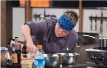  ?? COURTESY OF FOOD NETWORK ?? Carrie Eagle, executive chef at Farm &amp; Table in Albuquerqu­e, prepares a dish during an episode of Food Network’s “Chopped” that will air at 8 p.m. Tuesday.