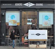  ??  ?? Left: Amy and Daniel McArthur of Ashers Baking Company and (right) their shop in Royal Avenue, Belfast