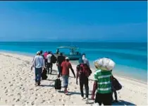  ?? CUSTOMS AND BORDER PATROL ?? A group of Cuban migrants landed Friday at the Dry Tortugas National Park.