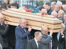  ??  ?? The coffin of Anthony Foley is carried from St Flannan’s Church in Killaloe.