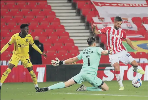  ?? PICTURE: NICK POTTS/ PA ?? GOAL: Stoke City’s Tommy Smith, right, scores his side’s second goal against Barnsley during the Championsh­ip match at the bet365 Stadium.