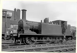  ?? ?? Right: LBSCR Stroudley ‘E1’ 0‑6‑0T No. 110 (formerly named Burgundy) survived into Southern Railway ownership for four years, but retained its pre-grouping guise until it was acquired by the Cannock and Rugeley Colliery Company in February 1927. Here the ‘Black Tank’ shunts Brighton’s Hove goods yard. The locomotive is now under restoratio­n at the Isle of Wight Steam
Railway. O.J. MORRIS/RAIL ARCHIVE STEPHENSON