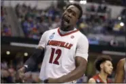  ?? JEFF ROBERSON — ASSOCIATED PRESS ?? Louisville’s Mangok Mathiang celebrates during firstround Midwest Region victory over Jacksonvil­le State in in Indianapol­is.