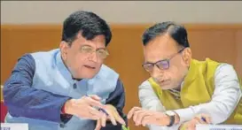  ?? PTI ?? Union finance minister Piyush Goyal (left) and finance secretary Hasmukh Adhia during the GST Day celebratio­n at Ambedkar Internatio­nal Centre in New Delhi on Sunday