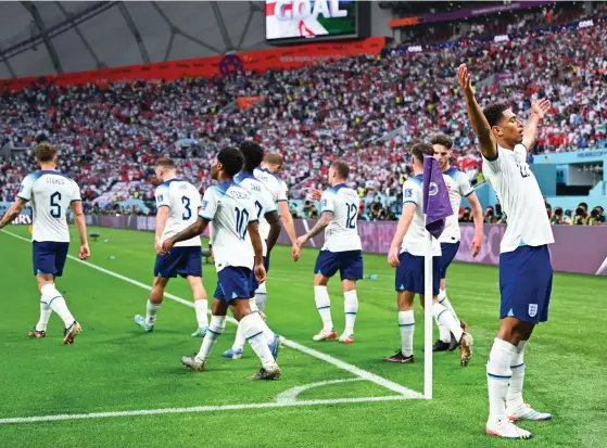  ?? REX ?? Dreamland: Bellingham laps up the adulation the crowd after scoring his first goal for England on his World Cup debut at 19