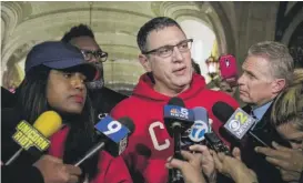  ?? ASHLEE REZIN GARCIA/SUN-TIMES ?? CTU Vice President Stacy Davis Gates looks on as union President Jesse Sharkey talks about the end of the teachers strike, Oct. 31, 2019.