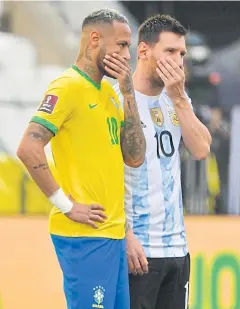  ?? AFP ?? Brazil’s Neymar, left, and Argentina’s Lionel Messi before their World Cup qualifying match is abandoned last month.