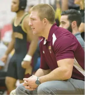  ?? JEN RYNDA/BALTIMORE SUN MEDIA ?? Hammond coach William Yeo watches his team during a 2018 match. The No. 15 Bears used a forfeit and three wins in the first four matches to take an 18-0 lead and never trailed en route to a 39-27 win over No. 12 Glenelg on Thursday.