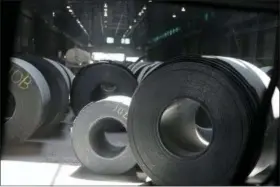  ?? JEFF ROBERSON — THE ASSOCIATED PRESS FILE ?? This June, 28, 2018, photo shows rolls of finished steel at a facility in Granite City, Ill.