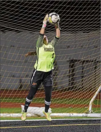  ?? PETE BANNAN — DIGITAL FIRST MEDIA ?? Penncrest goalie Bryn McLaughlin makes a save against Pope John Paul Class 3A semifinal Monday night, won by the Lions, 1-0. II in a District 1