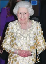  ?? Associated Press photo ?? Britain's Queen Elizabeth II arrives at the Royal Albert Hall in London to attend a concert to celebrate her 92nd birthday, Saturday.