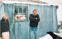  ?? PHOTO: SUPPLIED ?? It’s cold in them thar hills . . . Packer Jim Tallentire (left) and musterer Tim Crutchley outside the Blue Duck hut during a Soldiers Syndicate muster in 1989.