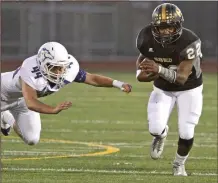  ?? Jayne Kamin-Oncea/For The Signal ?? KJ Maduike was the leading rusher for Golden Valley last season.