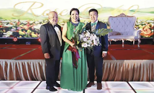  ??  ?? Celebrator Wilcon SEVP-COO and Philippine Retailers Associatio­n president Rosemarie Ong with her husband Antonio and son Amos Timothy.