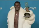  ?? ?? Jerrod Carmichael, winner for outstandin­g writing for a variety special, at the Emmy awards in 2022. Photograph: Jae C Hong/Invision/AP