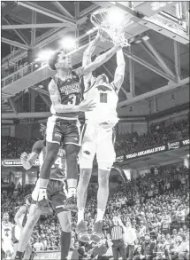  ?? Submitted Photo ?? Razorback senior forward Jalen Graham (#11) from Phoenix, Ariz., slam dunks for two against Mississipp­i State Saturday night at Bud Walton Arena in Fayettevil­le. The Razorbacks play at Texas A&M on Wednesday.