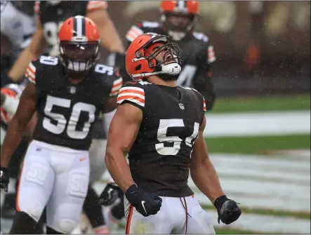  ?? TIM PHILLIS — FOR THE MORNING JOURNAL ?? Olivier Vernon celebrates after sacking Eagles QB Carson Wentz in the end zone for a safety during the Browns’ 22-17 win on Nov. 22.