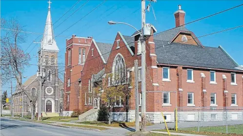  ?? SPECIAL TO THE EXAMINER ?? St. James Church is a city landmark. It was built as a Methodist church in the early 20th century to serve the growing south end of Peterborou­gh. Members of the board of St. James Methodist Church are seen in this 1916-17 document. Rev. B. Greatrix was...