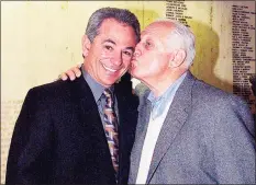  ?? NY Daily News via Getty Images ?? Mets’ manager Bobby Valentine gets a kiss from Dodgers’ vice president Tommy Lasorda at the New York Athletic Club, where Valentine was honored as the club’s manager of the year.