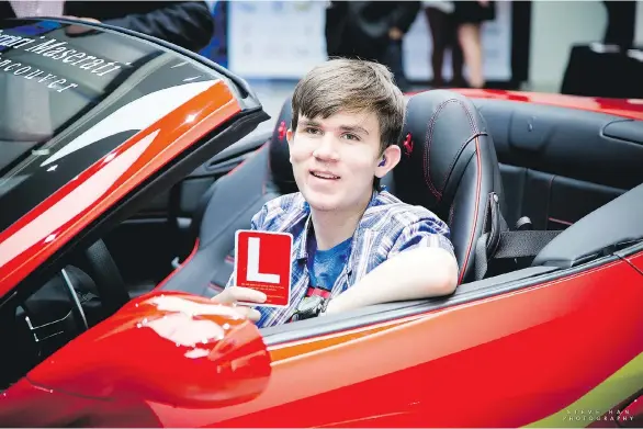  ?? STEVE HAN ?? Andrew Westerlund proudly displays his recently acquired ‘L’ as he sits behind the wheel of the LaFerrari he will be using in Saturday’s Diamond Rally up the Sea to Sky Highway.