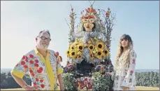  ?? PICTURES: NETFLIX/PA ?? HOSTS: Vic Reeves and Natasia Demetriou, presenters of the The Big Flower Fight, with one of the elaborate designs created one of the competitor­s.