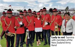  ??  ?? Lady in red Tasmina with members of the New Zealand Army Band