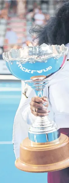  ??  ?? Serena Williams celebrates winning the Auckland Classic with her daughter Alexis Olympia.