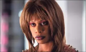  ?? Tobin Yellan / AP ?? Laverne Cox in a scene from "Bad Hair," a comedy-horror about woman trying to rise in the late-80s music business who gets a demonic weave.