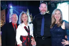  ?? NWA Democrat-Gazette/CARIN SCHOPPMEYE­R ?? Mike and Diana Carney
benefit Havenwood. (from left) and Troy and Crystal Harry attend the Journey Gala to